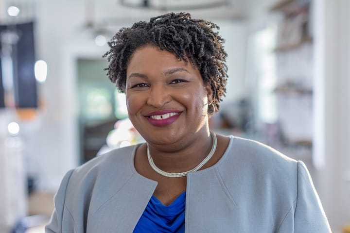 Photo of smiling Stacey Abrams
